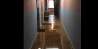 «Выплатим компенсацию»: вчерашний ливень затопил и оставил без света многоэтажку на Наличной