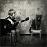 Фото Выставка Андрея Прохорова Маленькая девочка и кот Том
