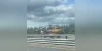 Удивленные водители заметили припаркованный рядом с ЗСД вертолет