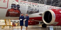 В Пулково презентовали самолет Superjet 100 в ливрее ЛизаАлерт