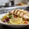 Салат «Искра» с курицей и лимонным соусом: быстрый рецепт для праздника