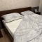 Заправленная кровать задает ритм утру и меняет ощущение дома
