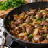Куриные сердечки на сковороде раскрываются после долгого тушения